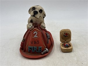 Dog fire hat figurine with wiggle bug in a