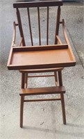 Wood high chair with attached tray