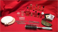 Vintage perfume bottles, nail files, hair combs