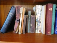 SHELF OF OLD BIBLES AND HYMNALS