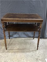 Inlaid rectangular side table with fretwork ends,