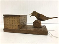 Chip carved folk art bird cigarette dispenser