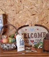 Welcome sign, seed hangers, fruit basket, Iowa