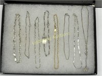 EIGHT STERLING SILVER ANKLETS