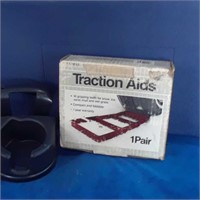 Car care.   A cup holder, traction aids, and