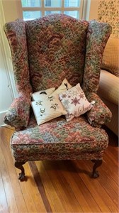 Tall wing back chair, with carved claw and ball