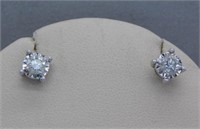 10K WHITE GOLD EARRINGS WITH .42 CT TW DIAMONDS.