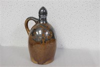 A vintage Sterling Overlay Musical Jug