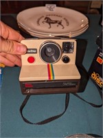 Vintage Polaroid one step camera & flashbar