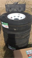 Four Unused Tires - ST235/85R16 With Rims
