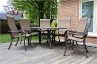 Cast patio set, 55" X 28"H table and 6 chairs,