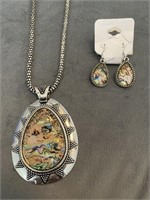 Interesting metal pendant necklace and earrings