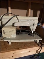 Singer sewing machine and button holer