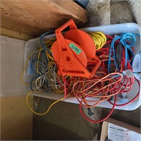 G613 Bin of Extension cords and reel