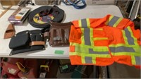 Reflective vest, tool belts, cable bag