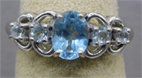 Sterling Silver blue topaz ring, size 8.