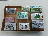 assortment of toy farmer tractors