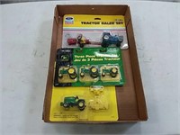 assortment of 1/64 scale tractors and implements