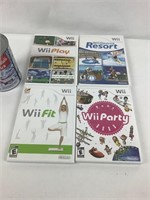 4 jeux vidéos Wii dont Wii Party -
