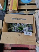 box of small artificial potted plants