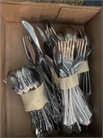 Silverware and holiday greeting plaques
