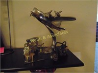 Small sculptures, airplane, motorcycle and more