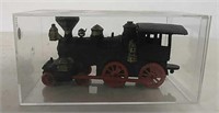 Western Auburn toy train in display case