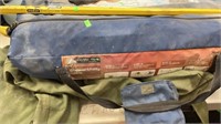 Military Bag, pry Bar, Shower Utility room by