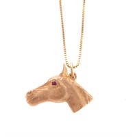 A Lady's Horse Pendant and Chain in 14K Gold