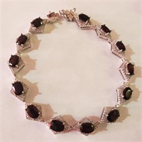 $700 Silver Garnet Bracelet