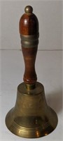 Brass bell with wooden handle
