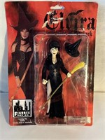 ELVIRA FIGURE ON CARD NEW IN PKG.