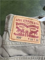 Two pairs of Levi’s. Tan size 33 x 30 and black