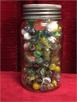 Crown Jar of Glass Marbles