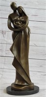 MODERN ABSTRACT BRONZE COUPLE HOLDING BABY