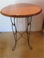 Soda fountain table with oak top. Measures 30"