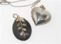 Silver puff heart pendant on silver chain