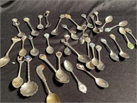 Novelty spoons from across the US including one