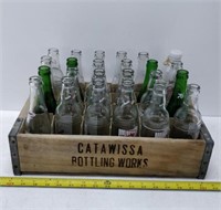 collection of pop bottles in catawissa case