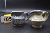 2 tiny litte hand crafted pottery "pitchers"