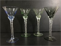 Four art glass sherry glasses