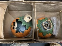 Cast iron pumpkin jack-o-lanterns.