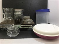 Assortment of glass and plastic containers. Nine