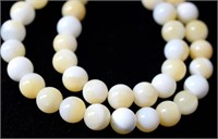 Natural 15.5" Strand Half Yellow Shell Round Beads