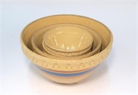 Nest of four yellow ware mixing bowls,