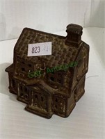 Small vintage cast-iron coin bank - does need a