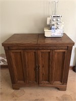 33X19X31 INCH SEWING CABINET WITH A BERNINA