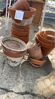 Assorted clay pots and bottoms