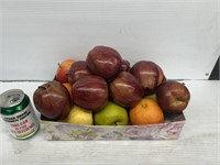 Box of decorative fake fruit