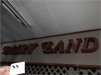 DAIRY LAND Sign